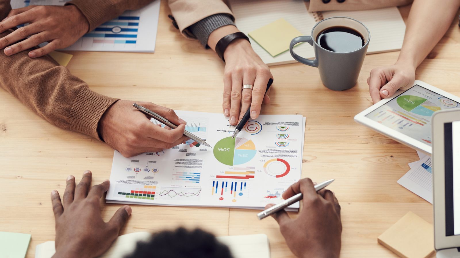 Financial services professionals working through an AI initiative