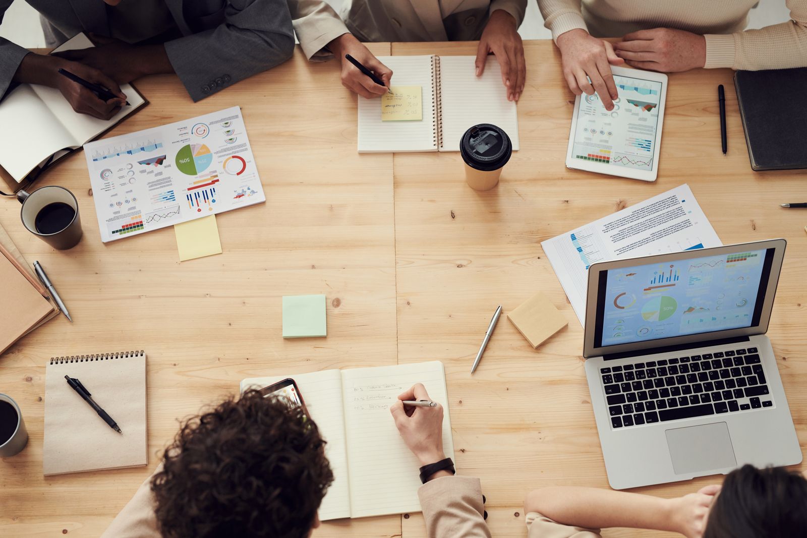 Real Estate Finance team reviewing work at a desk